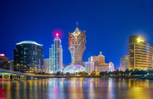 Macau casino revenue forecast raised as recovery momentum strengthens